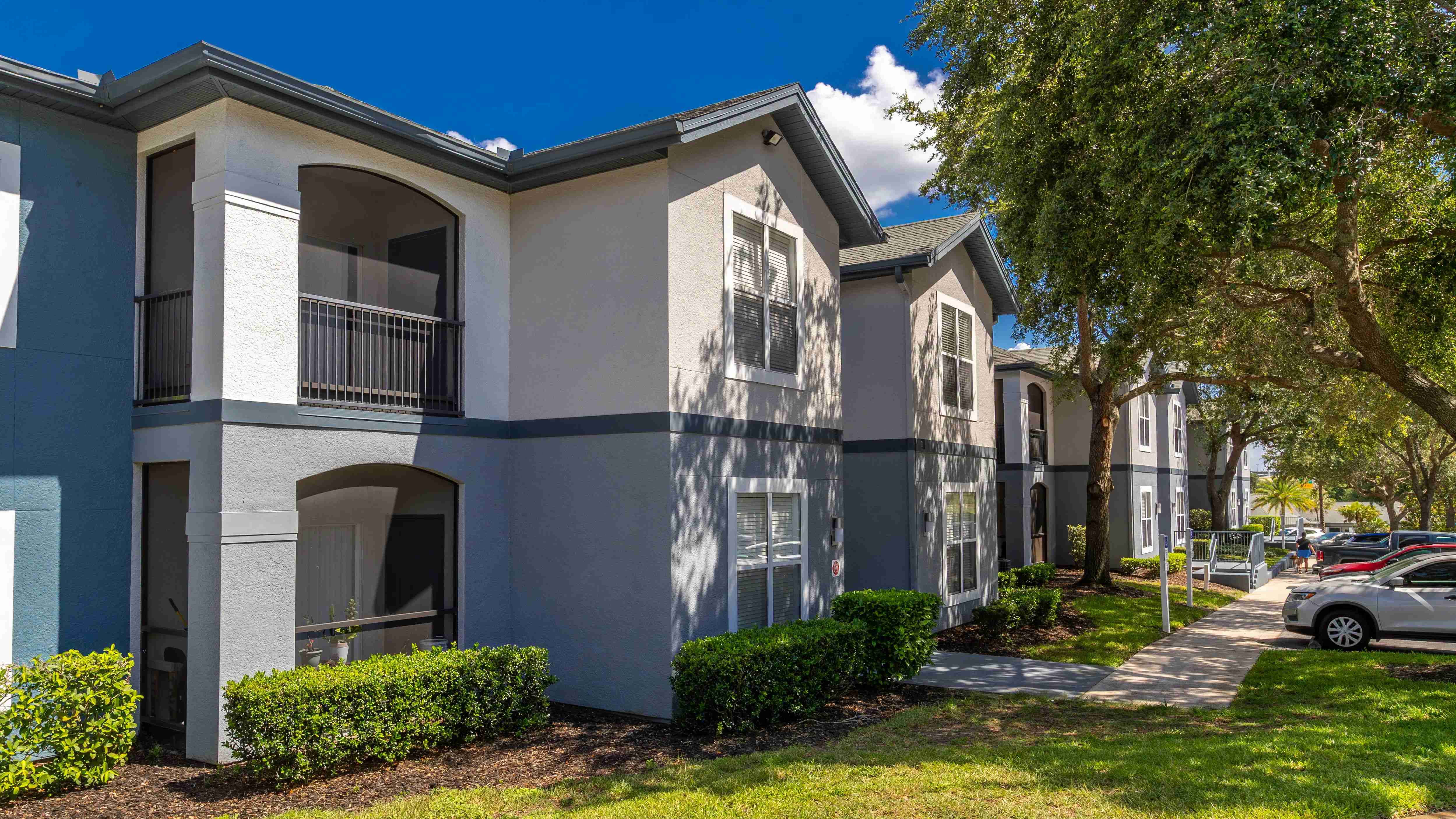 Elevate 155 offers beautifully updated exteriors with lush landscaping, and private screened patios—just steps from convenient on-site parking.