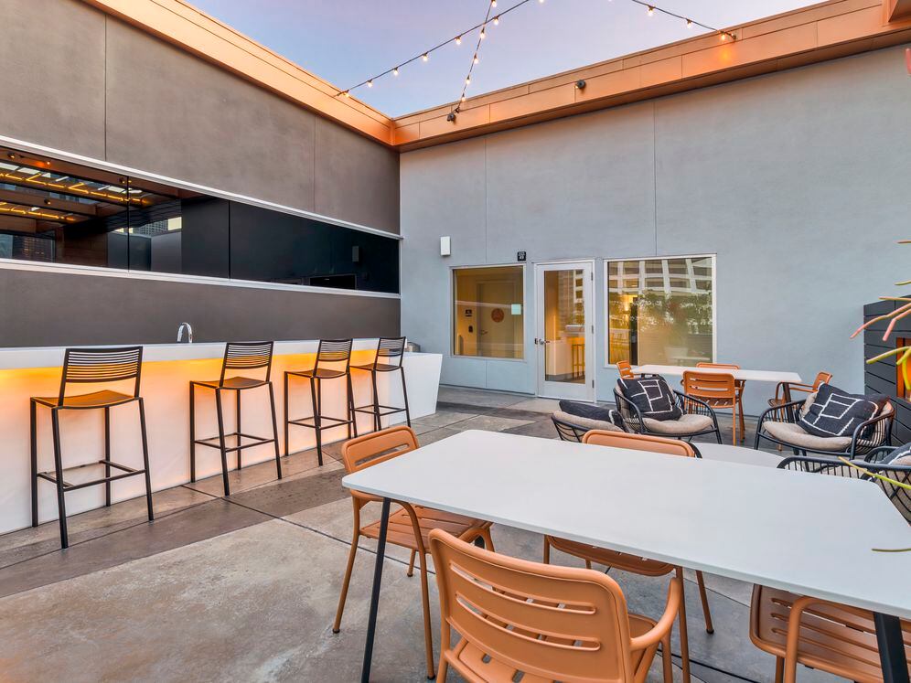 Rooftop with kitchenette and lounge seating