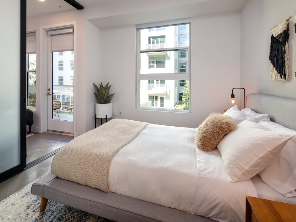 Bedroom with sliding barn door