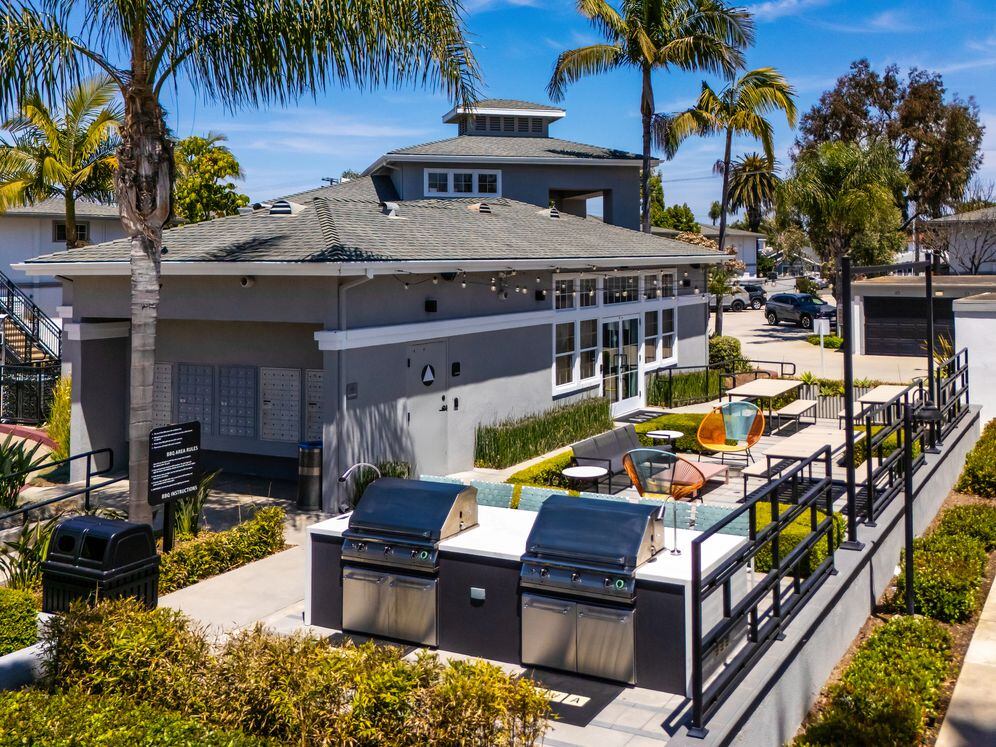 Outdoor lounge with BBQ grills