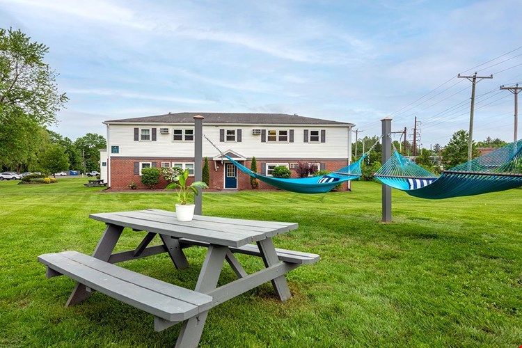 Lay down and relax after a long day at our hammock garden.