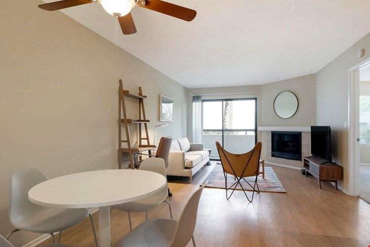 Furnished+ apartment homes include a dining set (Representative Image – exact items and style of furnishings may vary)