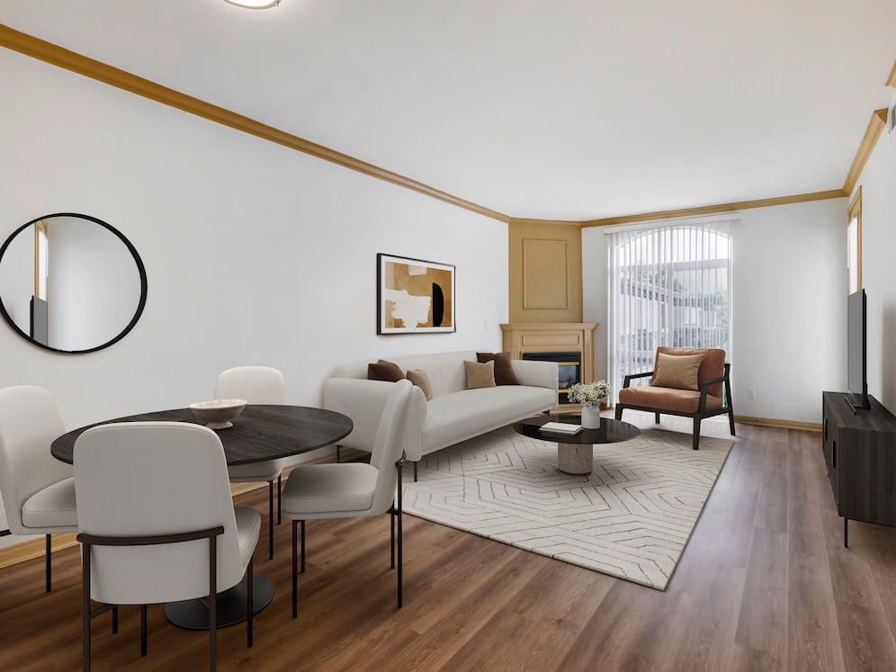 Renovated Package I dining and living room with hard surface flooring