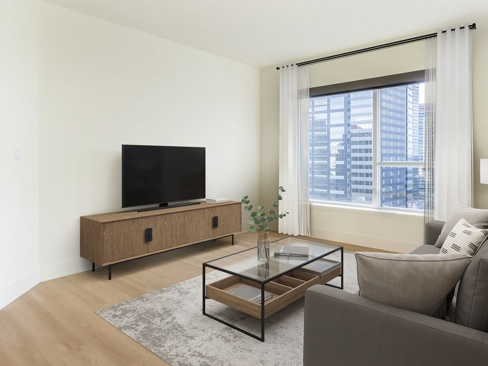 Renovated Package I living room with hard surface flooring