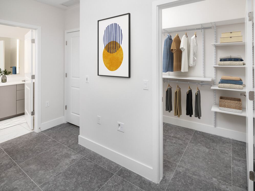 Signature Collection Townhome bedroom with walk-in closet