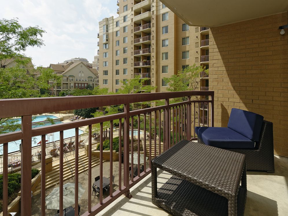 Balcony overlooking pool