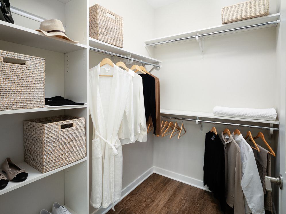 New West Phase Apartments - Spacious walk-in closet with built-in shelfing