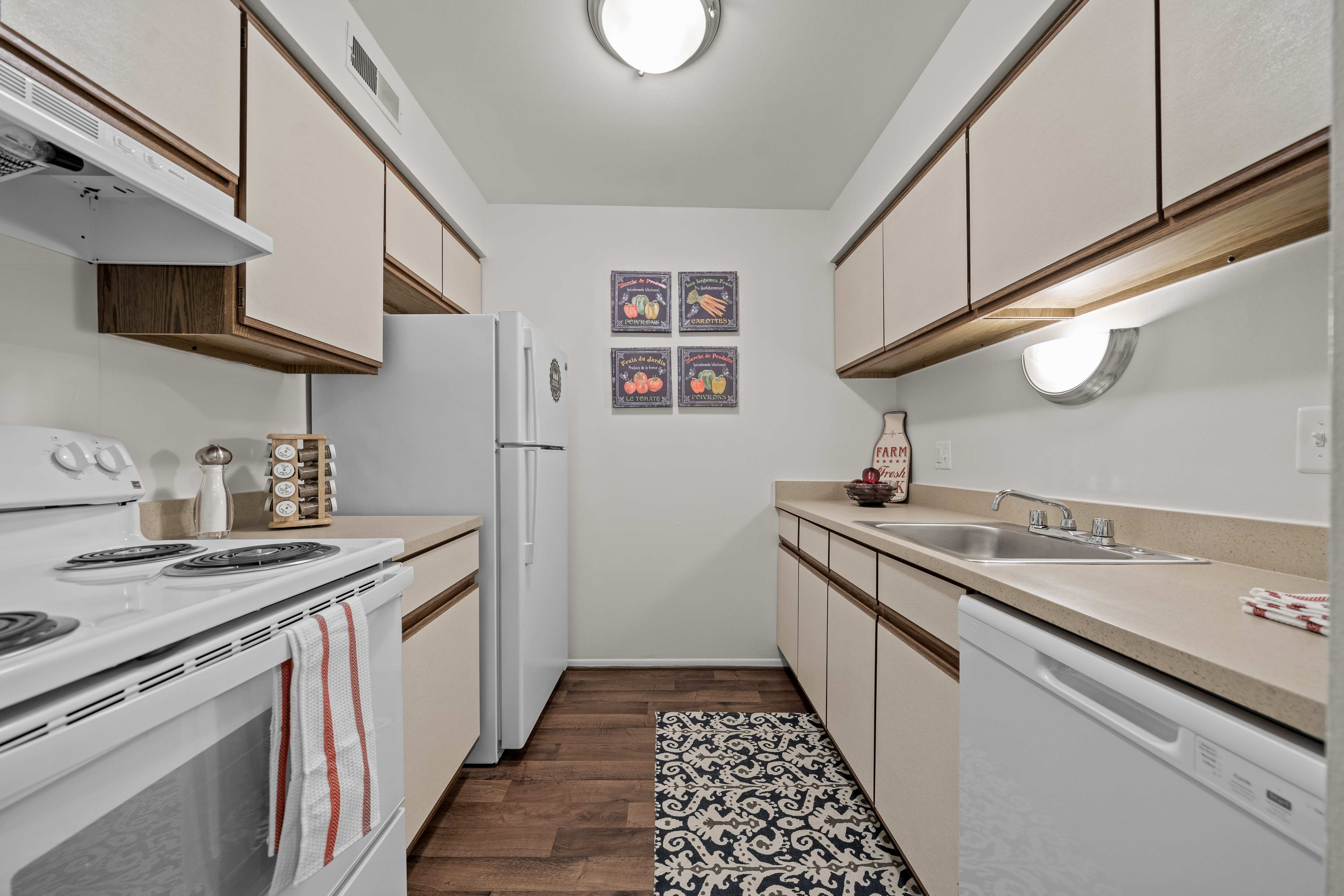 Bright kitchen at Westwood Village Apartments in Westland, MI