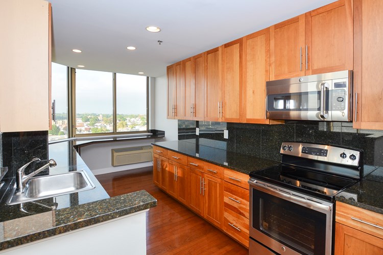 Fully-equipped kitchen with granite countertops