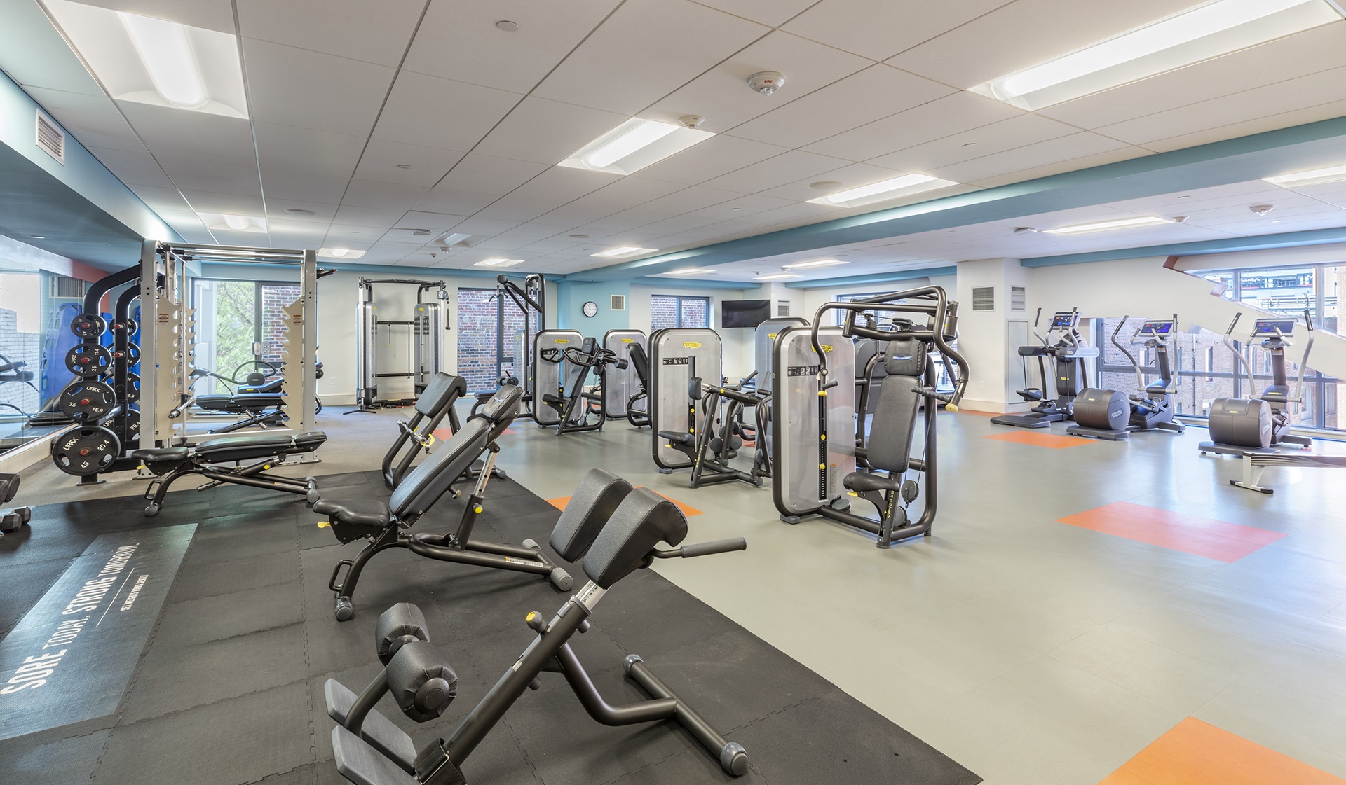 The fitness center is equipped with both free and machine weights