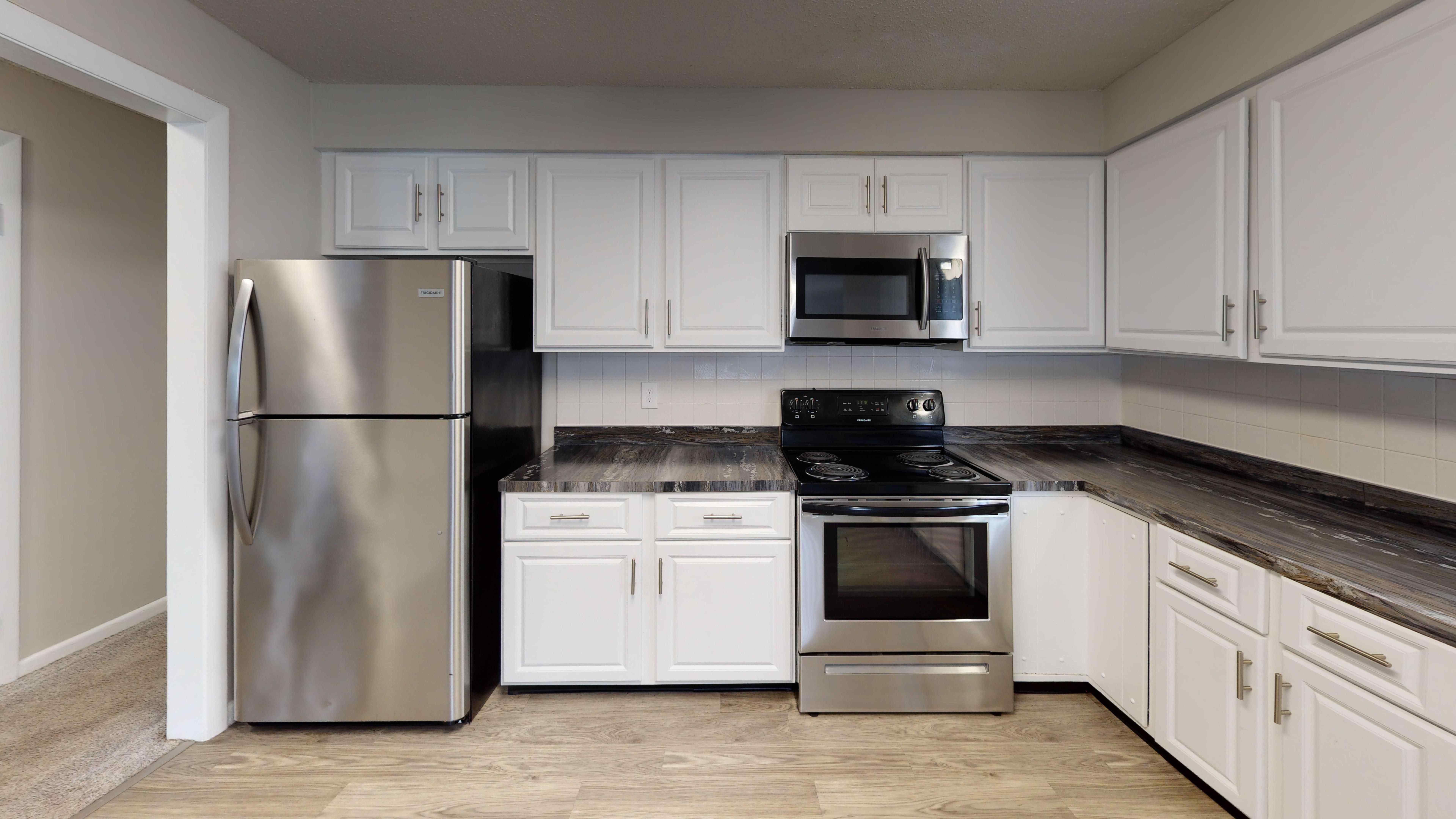The Pioneer’s kitchen is designed for both function and style, offering a modern cooking space with stainless-steel appliances, abundant cabinets, and updated finishes.