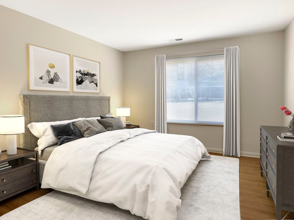 Bedrooms with hard surface flooring in select homes