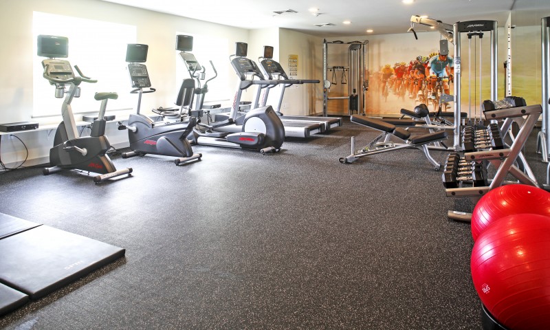 24/7 Fitness Center with personal TVs