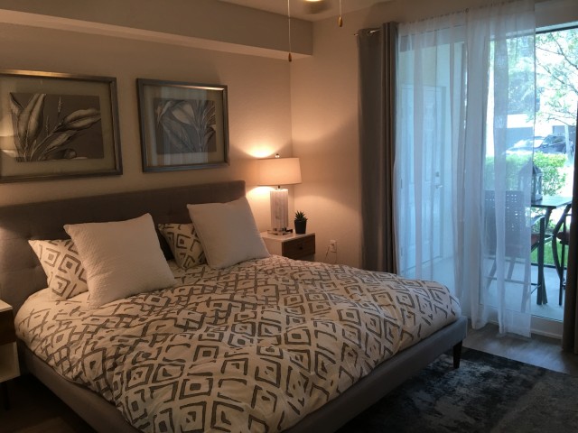 One Bedroom Banyan-Floor to Ceiling Glass Sliding Door- Easily fits a King Size Bedroom Set