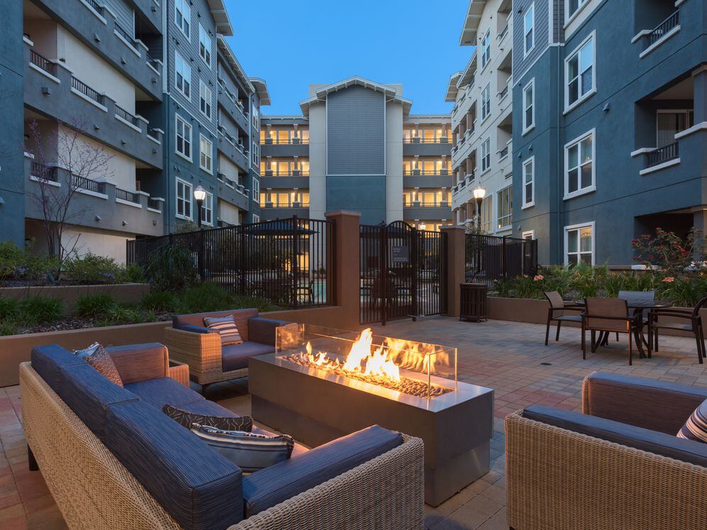 Courtyard with firepit and lounge seating