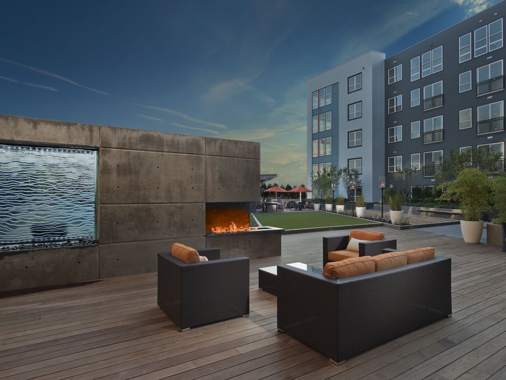 Courtyard with outdoor fireplace and lounge seating