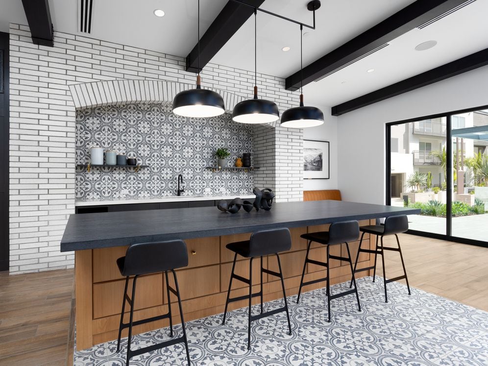 Resident lounge with seating and dining areas