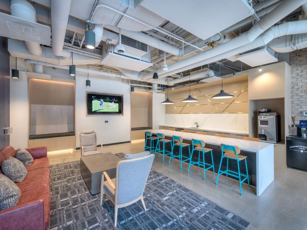 Chill lounge with seating, entertaining kitchen and flat screen television