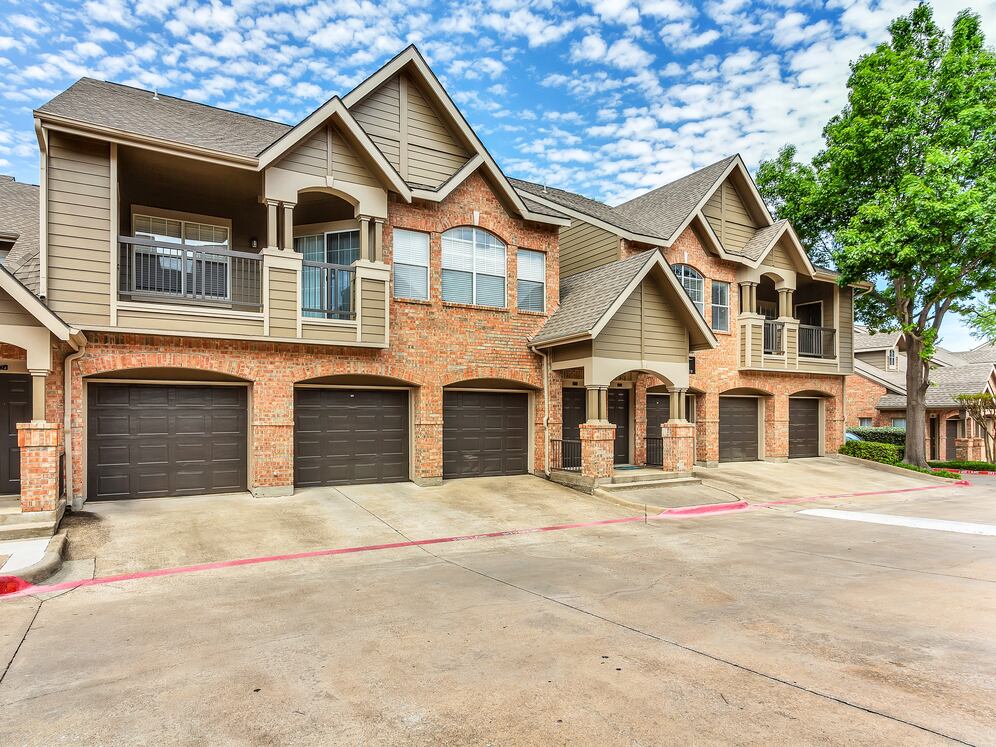 Attached garages with every apartment, building exterior