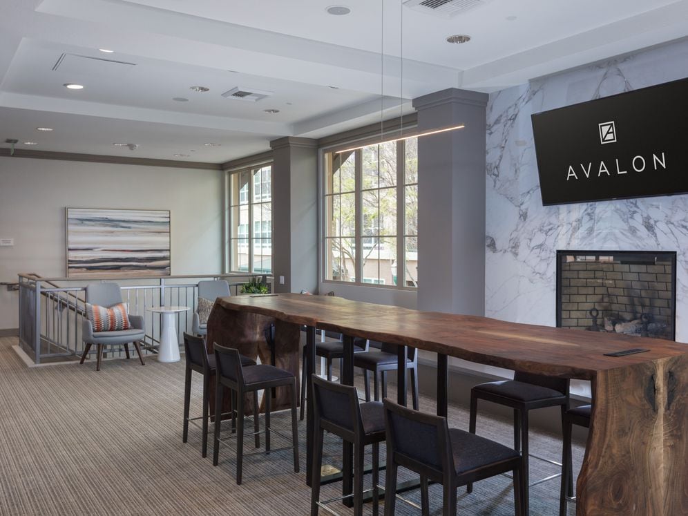 Resident lounge with fireplace and TV