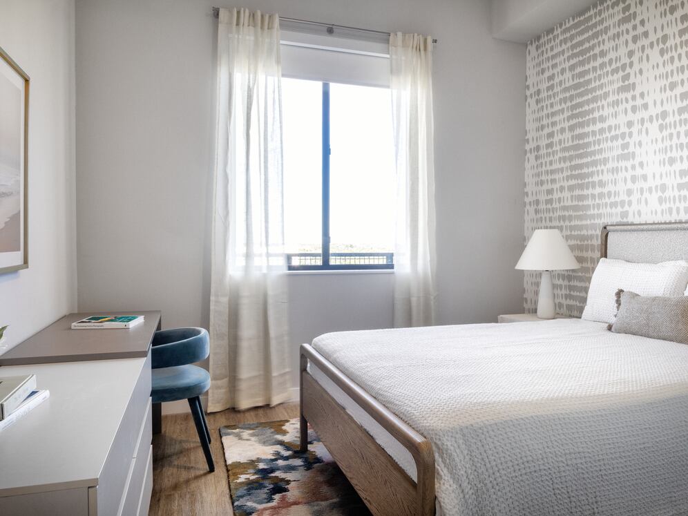 Bedroom with vinyl plank flooring