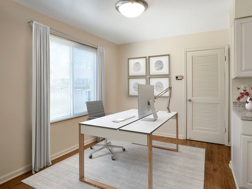 Renovated Package I apartment homes featuring hard surface flooring in select units