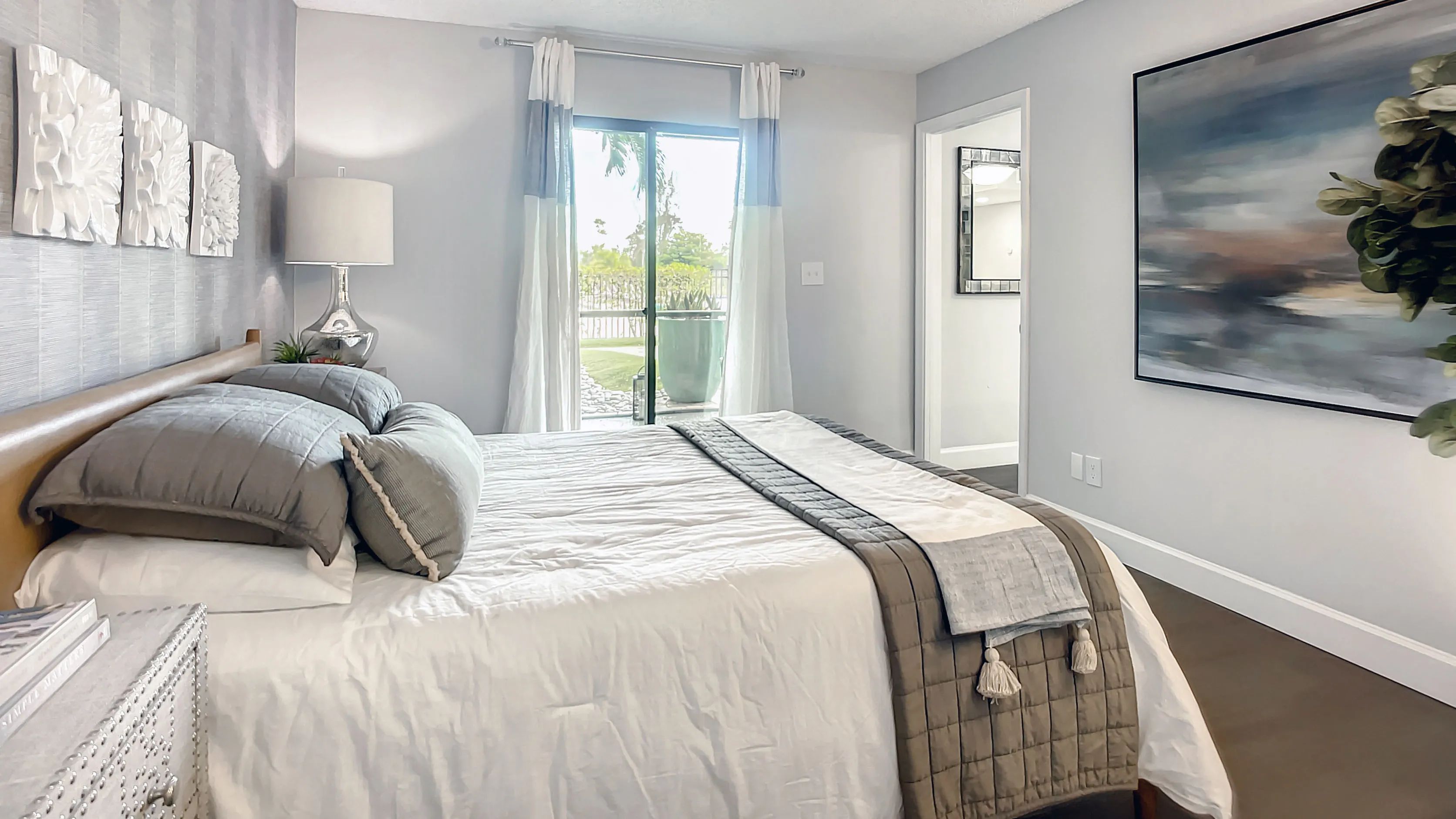 Elevate your living and step out from elegance into tranquility - the Riviera master suite offers direct lanai access, inviting you to unwind amidst the perfect balance fusing sophistication with an alfresco escape.