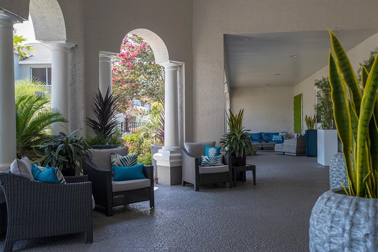 Relax in the shade at our poolside lounge area. 