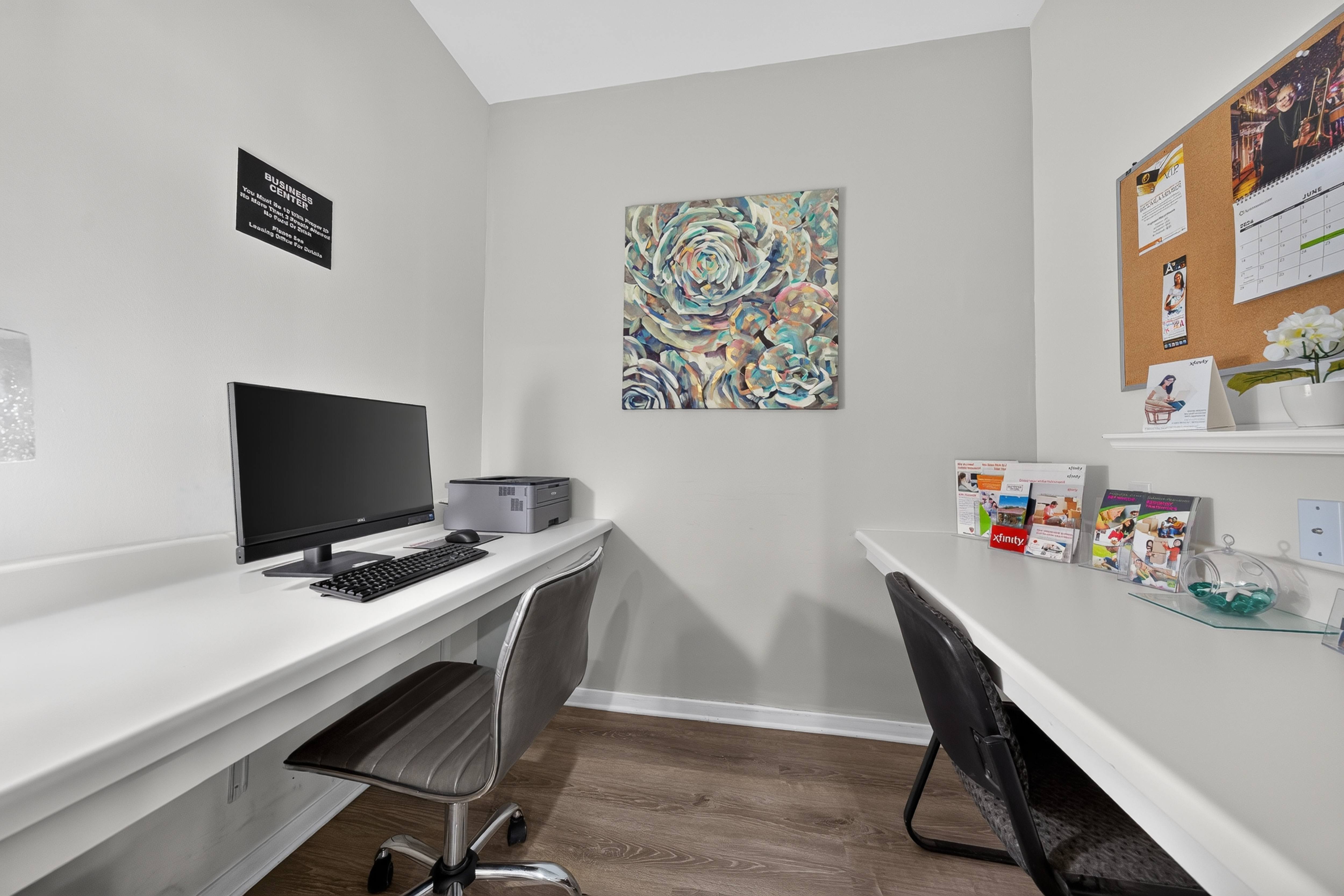 Clubhouse with coworking lounge at Eastwood Village Apartments in Clinton Township, MI.