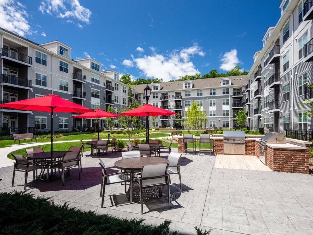 Courtyard with grill stations and dining area