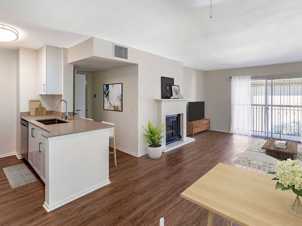 Renovated Package I kitchen, dining, and living area with hard surface flooring