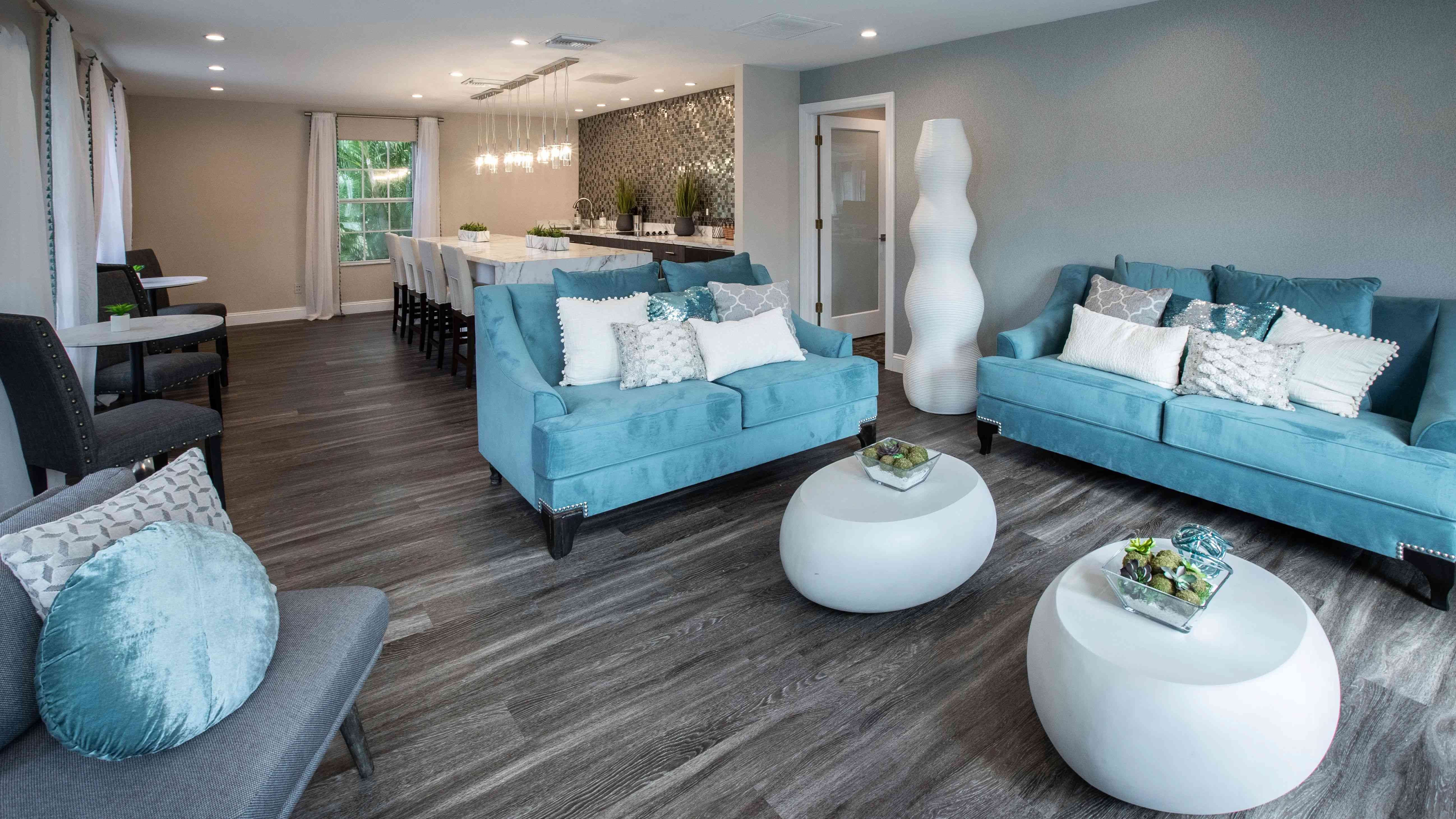 Discover the heart of community life in our inviting clubroom, a space designed for dynamic resident events and delightful gatherings at River Reach. 