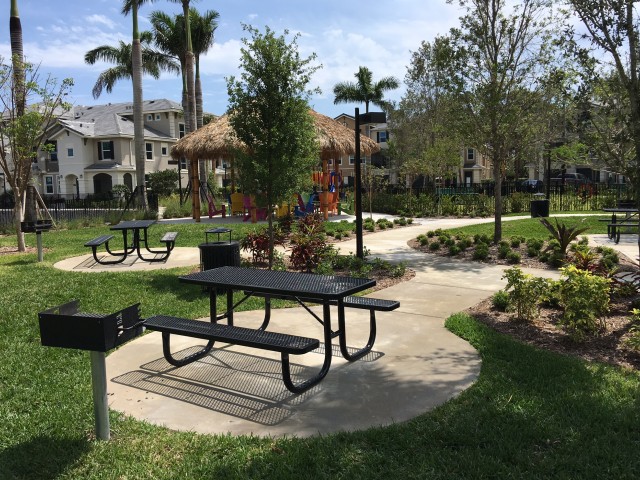 Charcoal and gas grills throughout community.