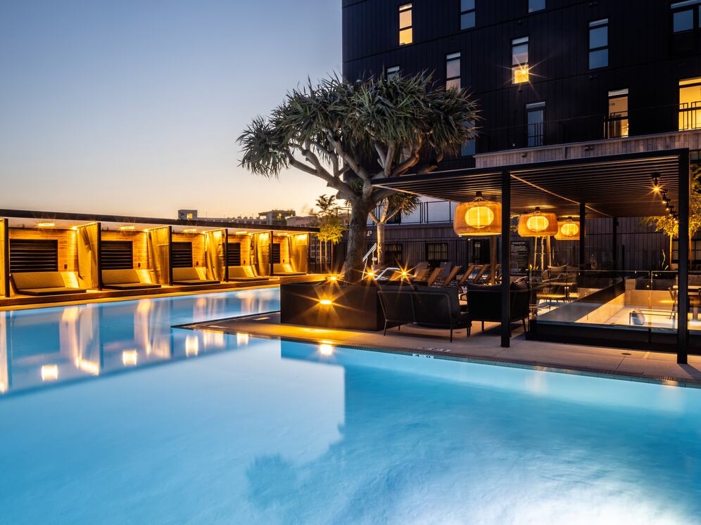 Pool and sundeck with cabanas