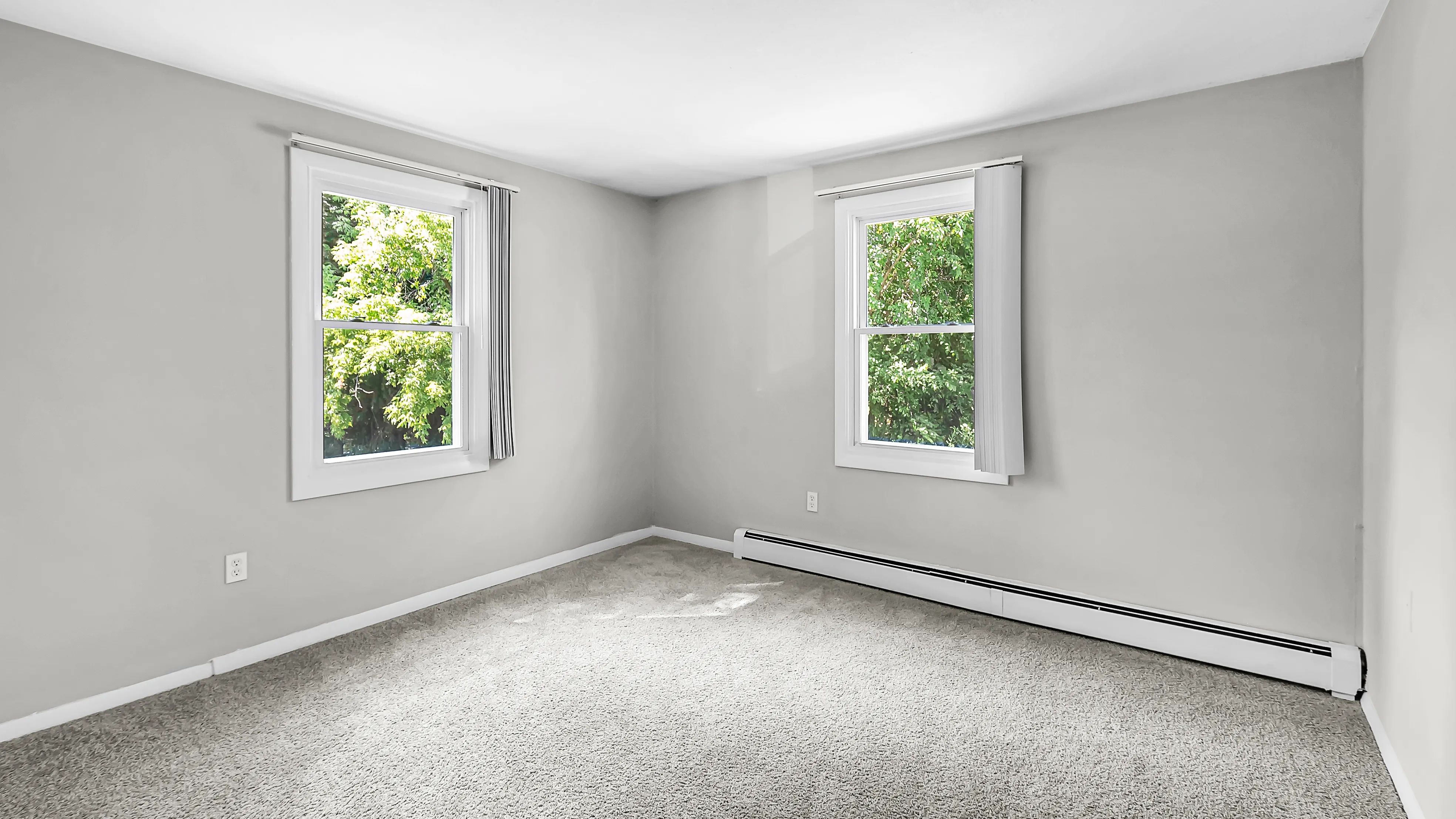 Brighten your days in Aspen Chase's sun-kissed bedrooms, where the windows fill your space with warmth and light.