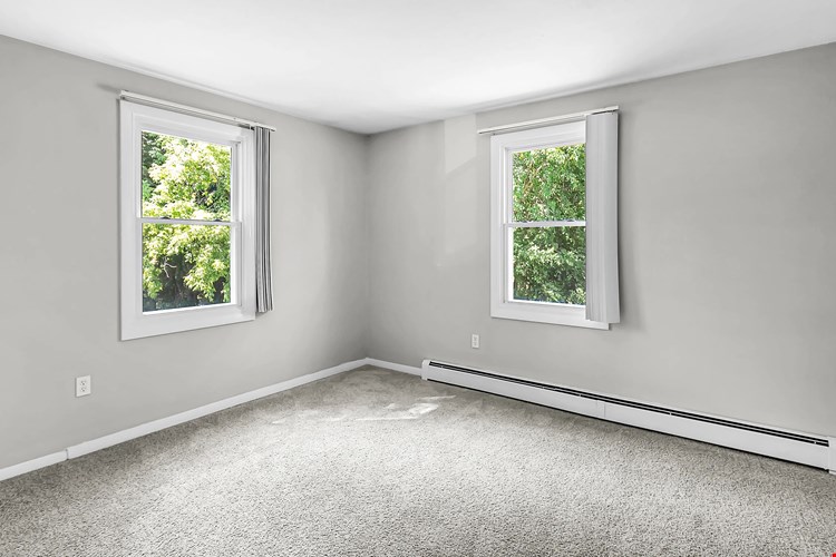 Brighten your days in Aspen Chase's sun-kissed bedrooms, where the windows fill your space with warmth and light.