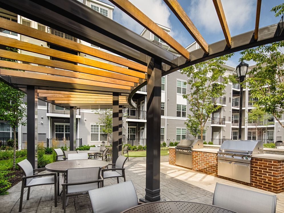 Courtyard with grill stations and dining area