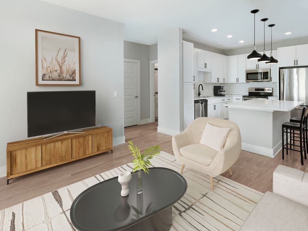 Kitchen, living, and dining areas with hard surface flooring