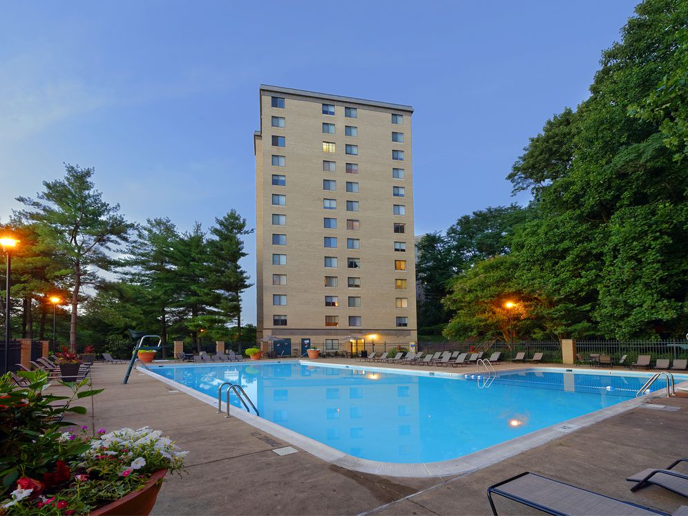 Swimming pool and sundeck with lounge seating
