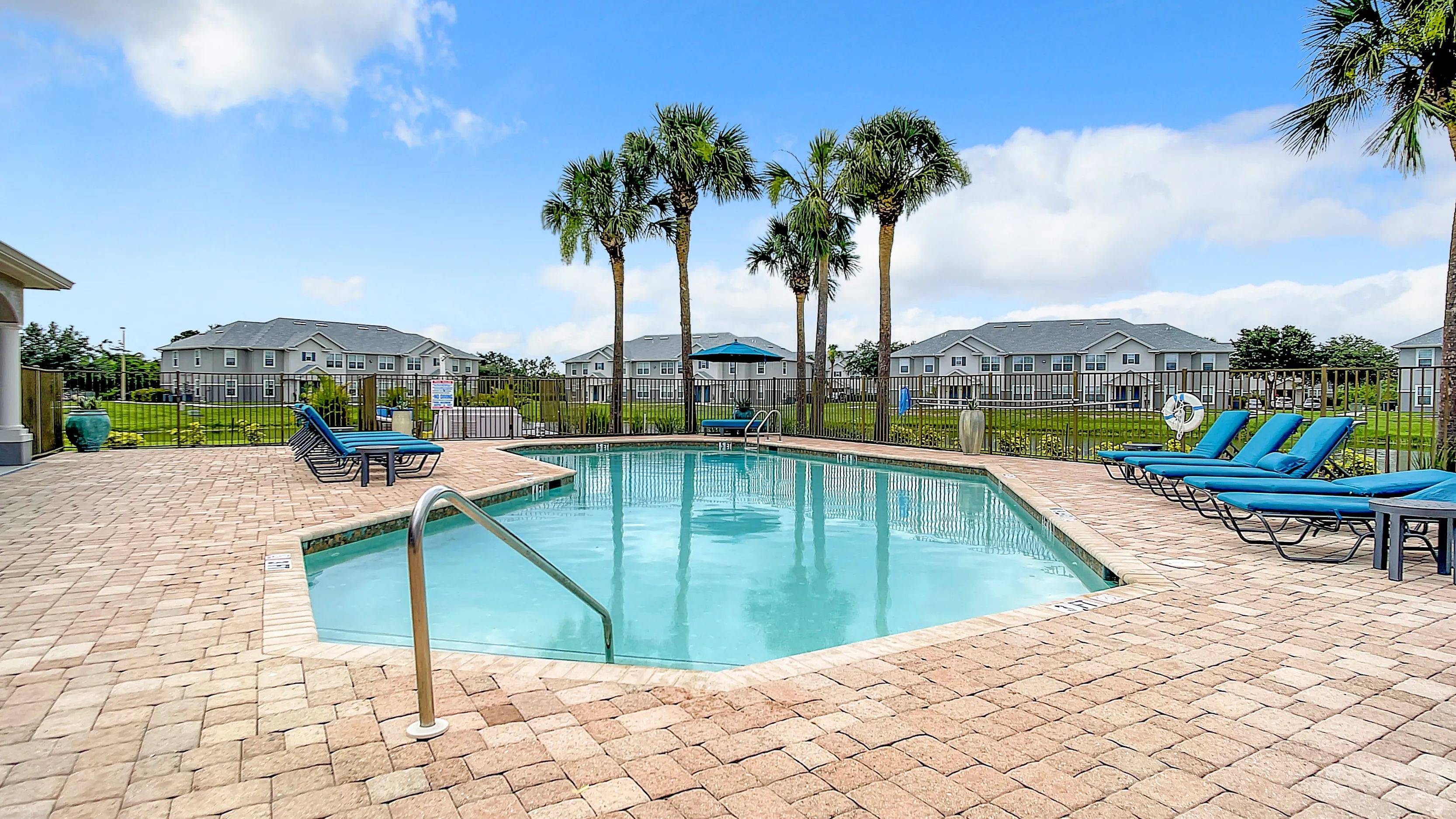 Welcome to your outdoor haven, where the Florida sun meets sanctuary. Our sparkling pool invites you to unwind and soak up the sun in style on our expansive pooldeck. 