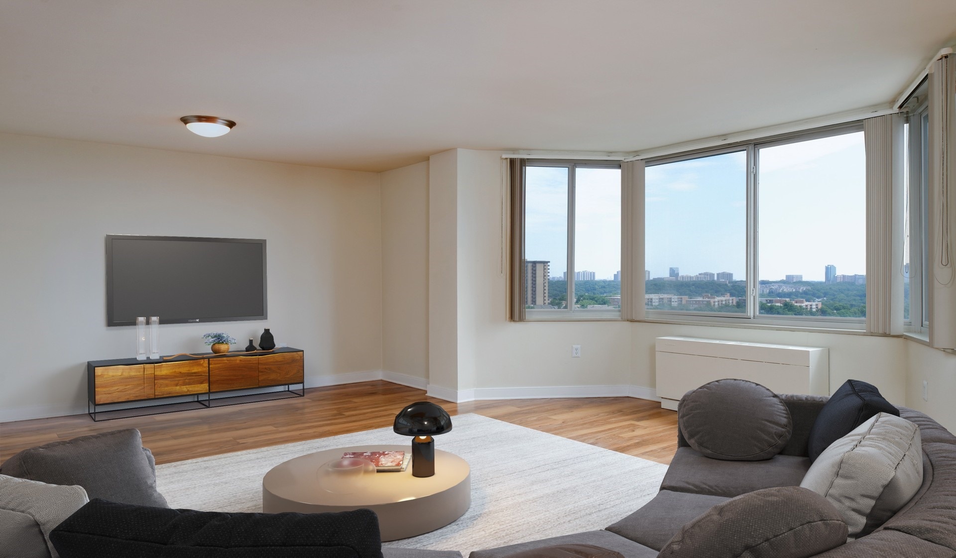 Large living space with a bay window