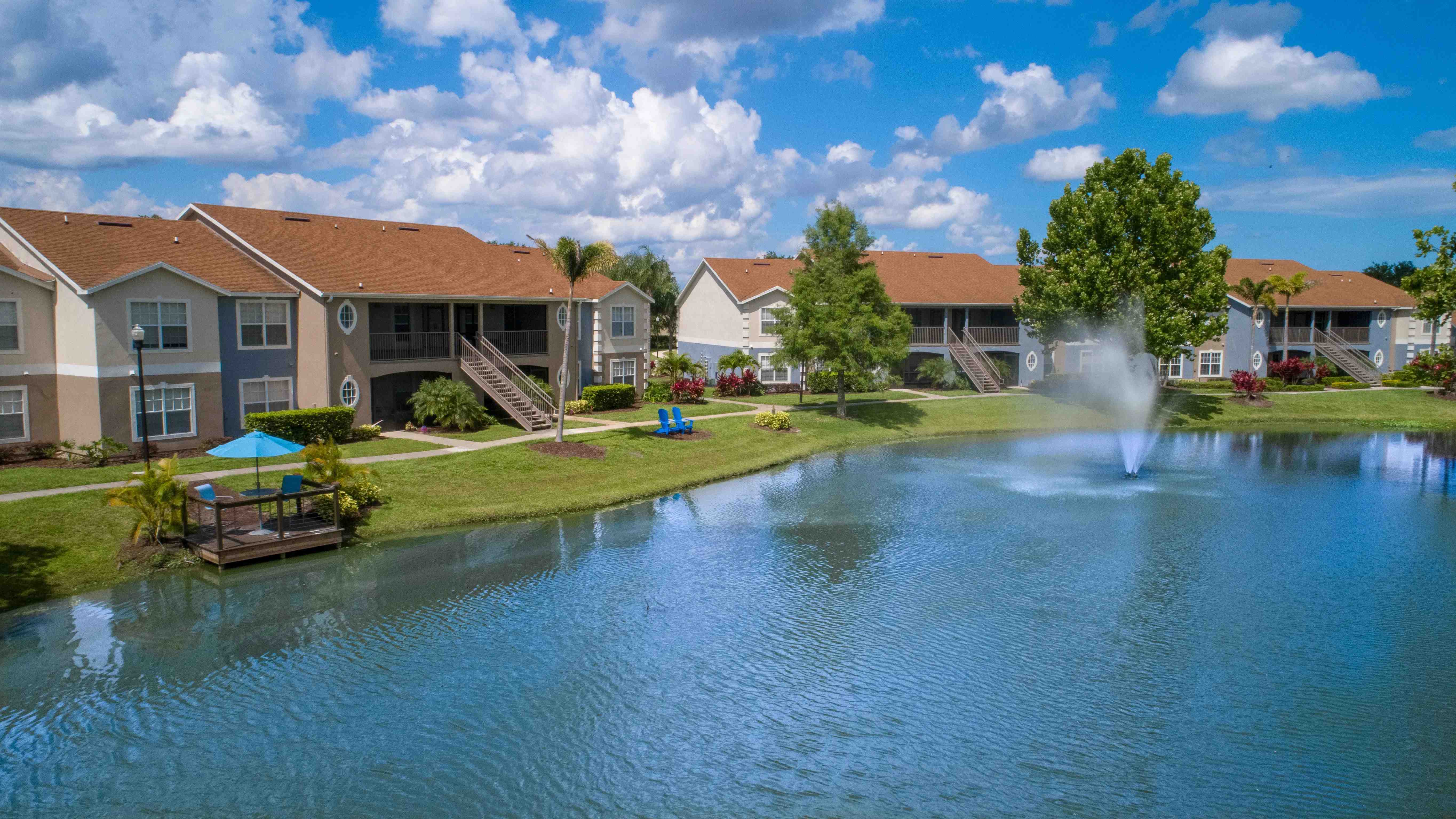 Embrace charming lakeside living in St. Cloud, with captivating views and lush landscapes - providing a tranquil retreat for all residents to savor. 