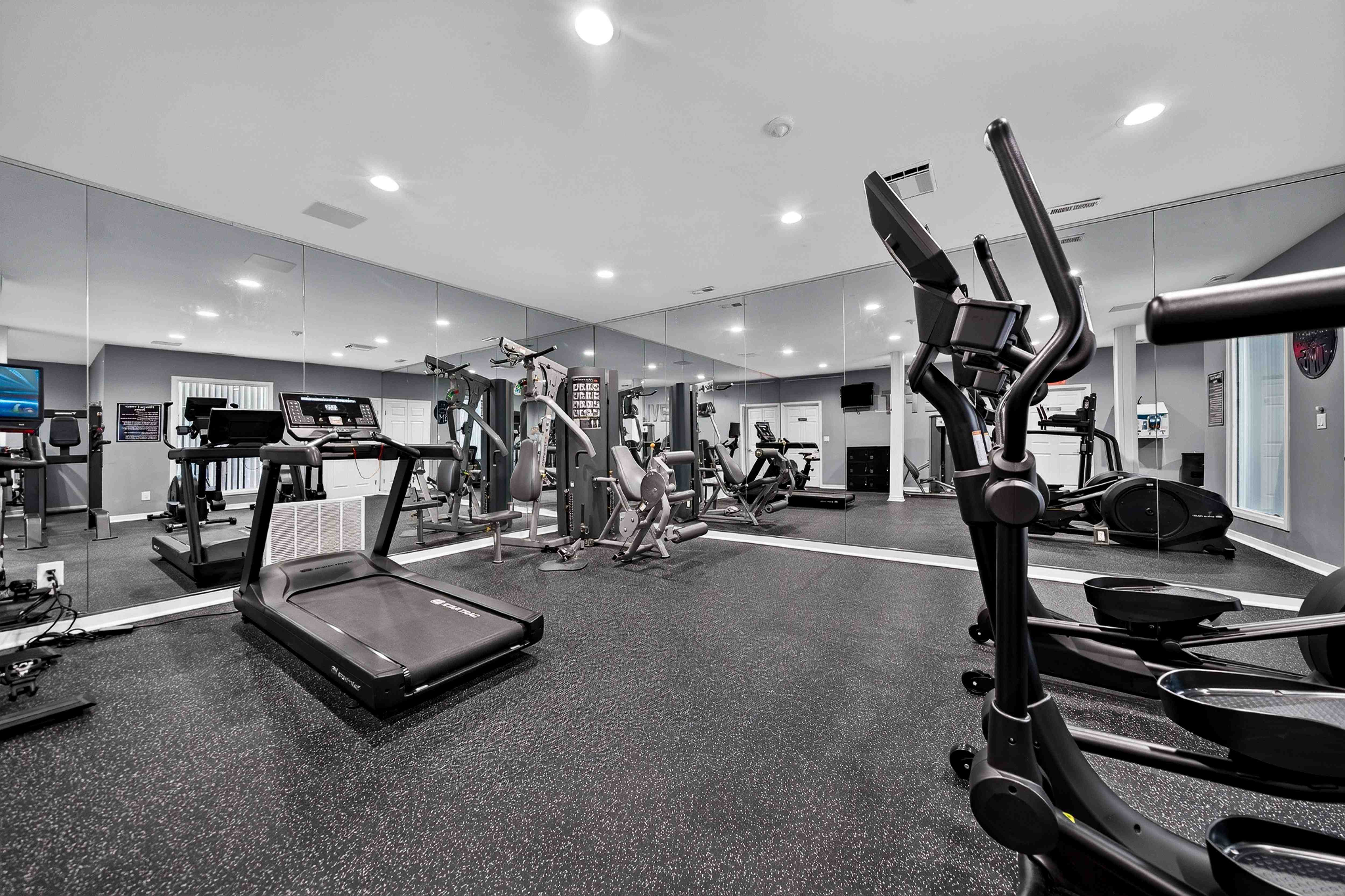 Upgraded 24-hour fitness and wellness center at Westwood Village Apartments in Westland, MI.