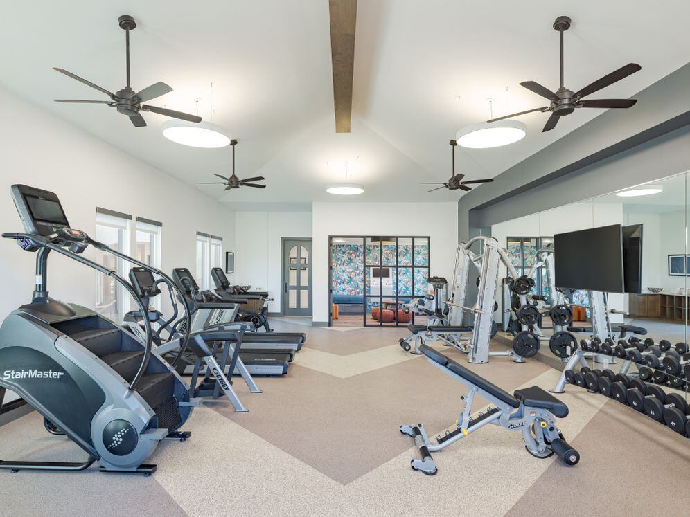 Fitness center with strength and cardio equipment