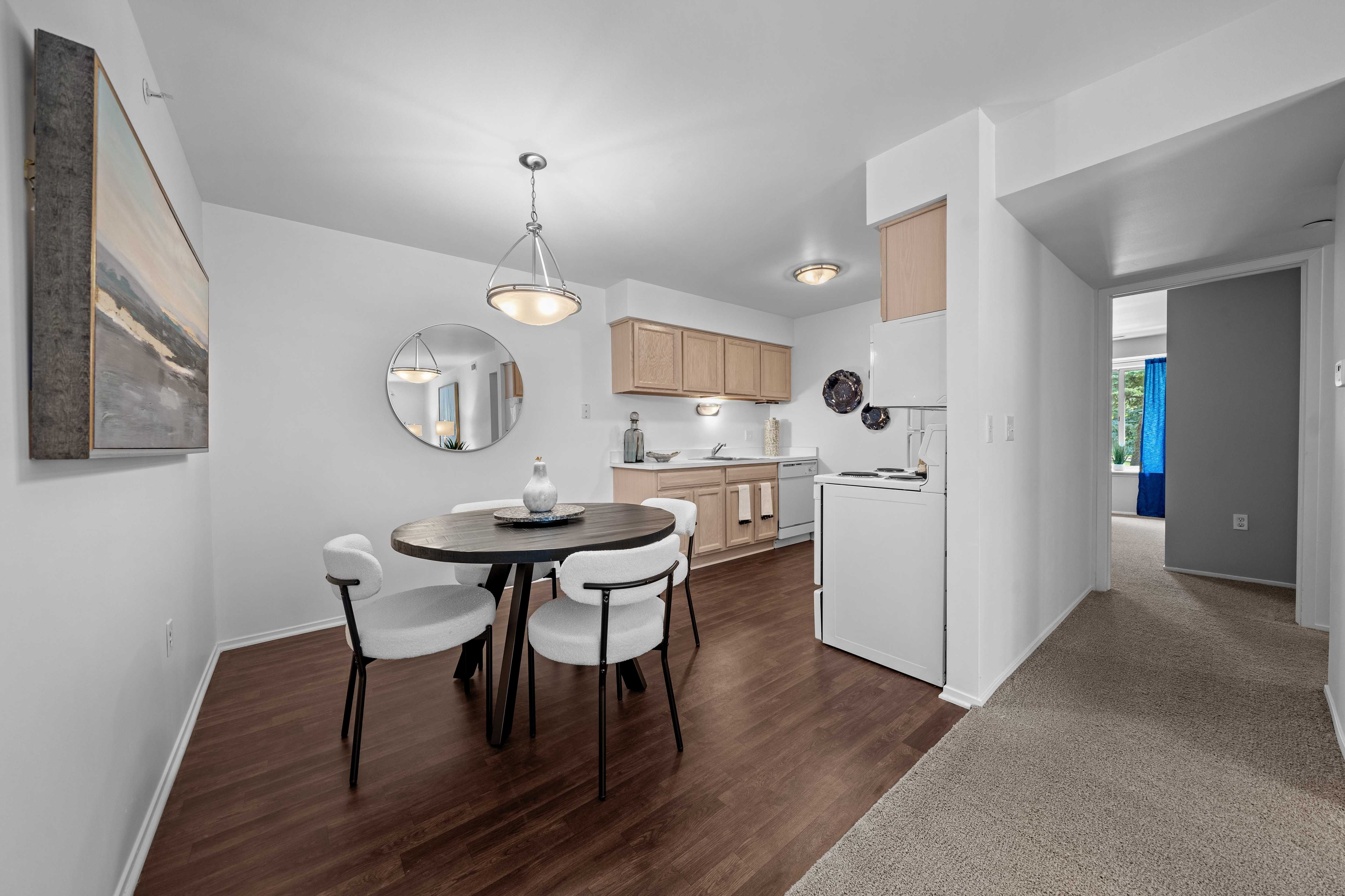 Large kitchen and dining room at Prentiss Pointe Apartments in Harrison Township, MI