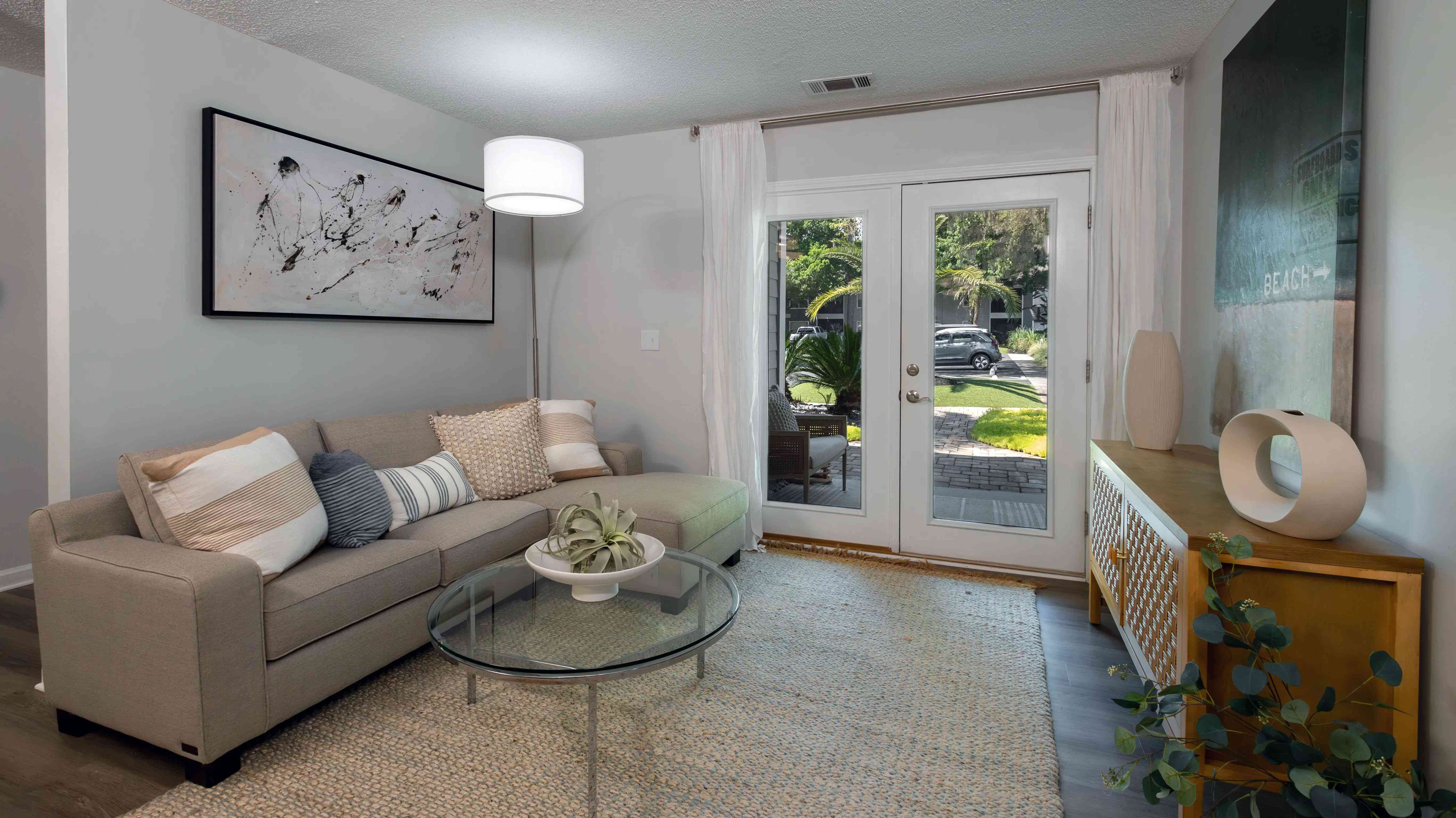 Embrace upscale living in our bright, spacious living rooms with French doors, inviting you to extend your living space to a private screened-in patio or balcony. 