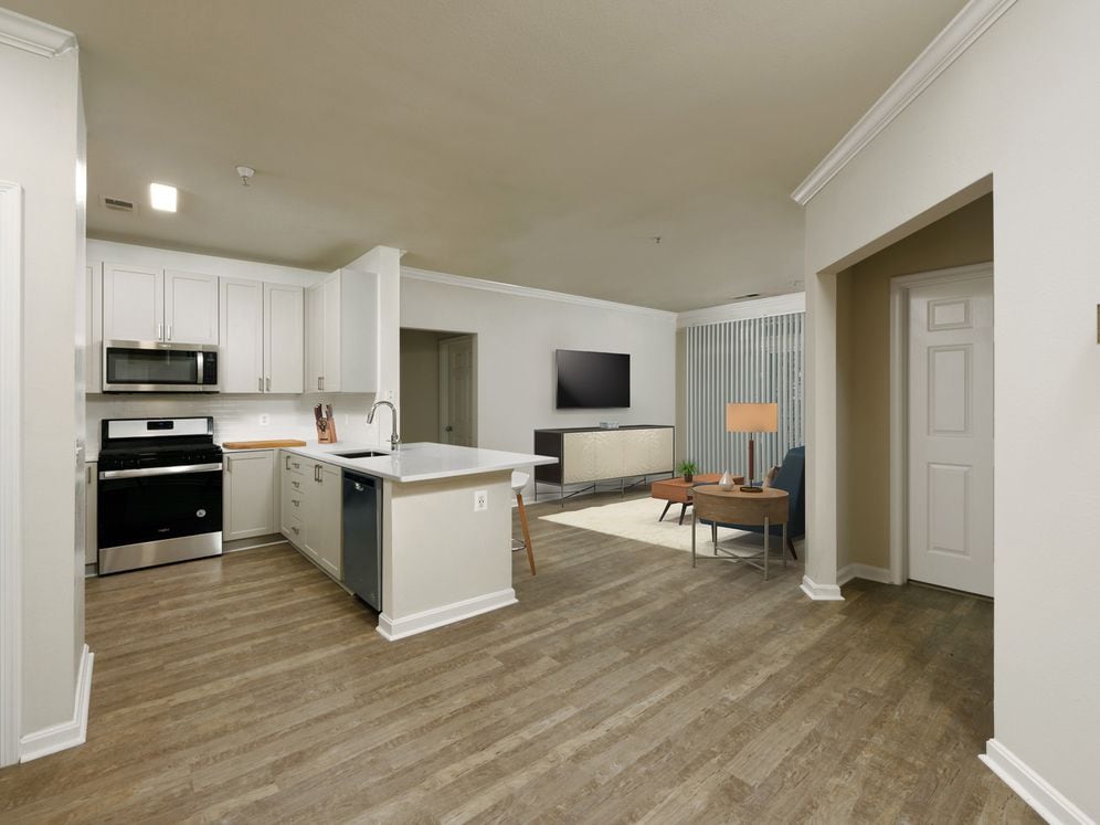 Renovated II kitchen and living areas with hard surface flooring