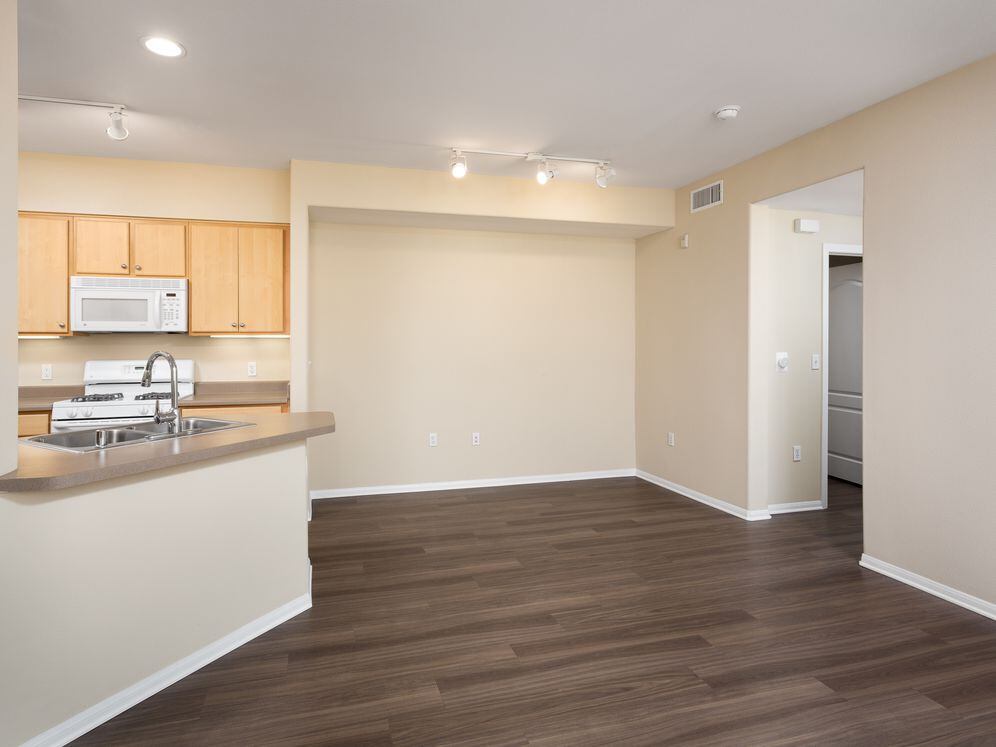 Finish Package I kitchen and dining area with hard surface flooring (select homes)