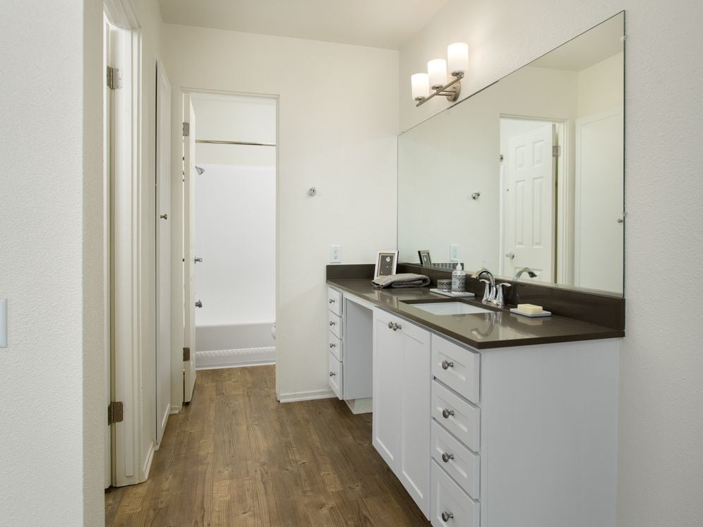 Modern Apartment Bath with Quartz Countertops