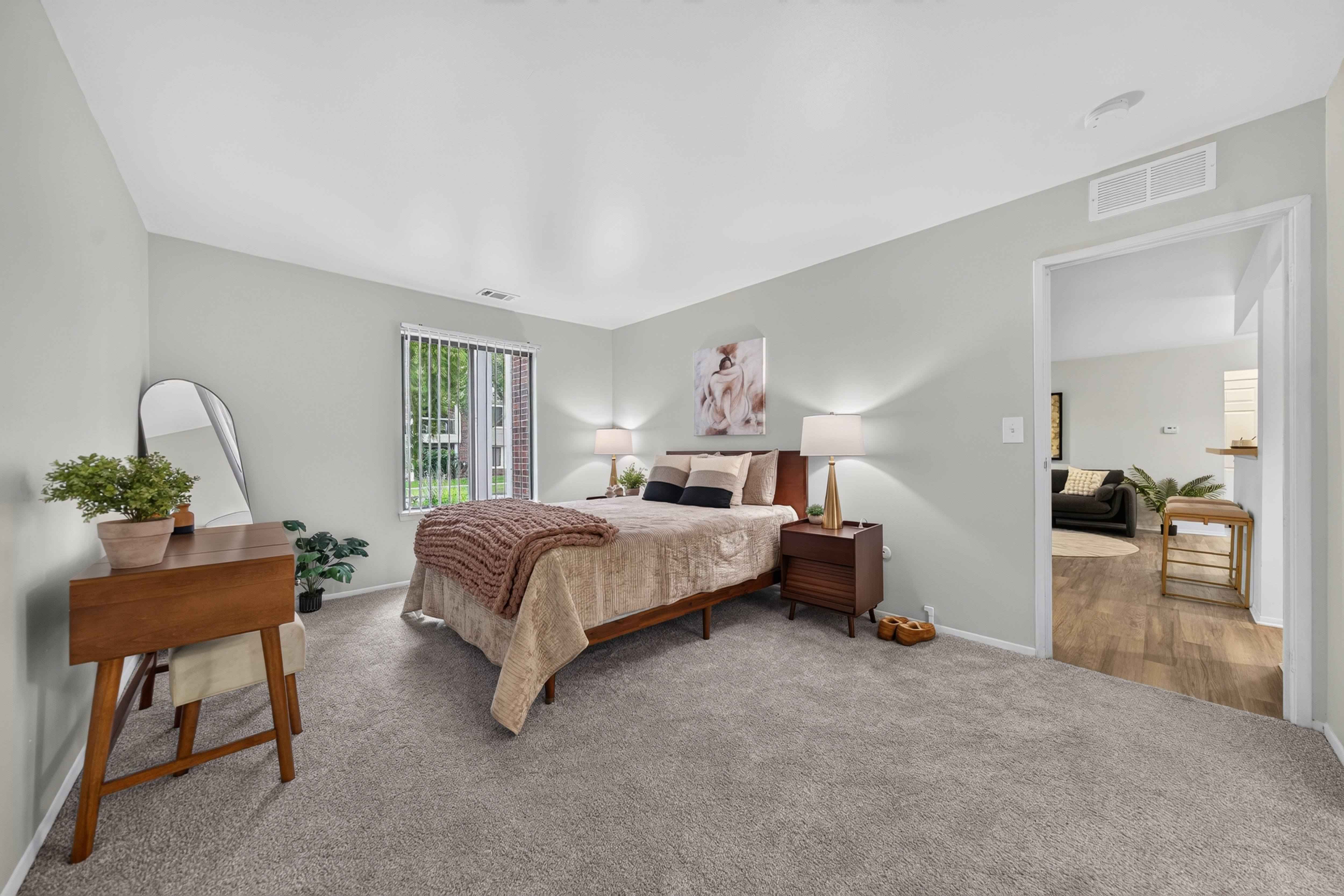 Spacious bedroom with ample storage at Park Lane Apartments in Southfield, MI.
